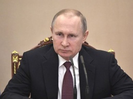 Путин в четвертый раз занял президентское кресло