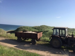 Пограничники поймали мужчину, укравшего 6 тонн песка с пляжа в Одесской области
