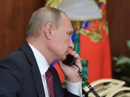 Путин охарактеризовал телефонный звонок Порошенко