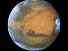 Ученые обнаружили под поверхностью Марса жидкую воду