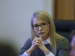 Тимошенко появилась в Одессе в откровенной майке с глубоким декольте