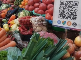 На Бессарабском рынке в Киеве теперь можно рассчитываться криптовалютой