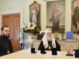 Патриарх Филарет наградил главу Нафтогаза орденом
