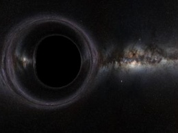 Ученые: Гигантская черная дыра находится ближе к Земле, чем предполагалось