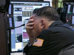 Apple и Goldman Sachs потянули вниз американские биржевые индексы