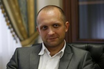 На заседании парламентского комитета показали видео, как нардепу Полякову передавали взятки