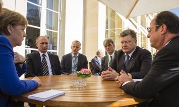 Guardian: Встреча в Париже подняла настроение Москве и Киеву