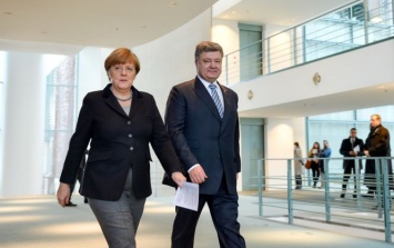 Меркель и Порошенко договорились встретиться в Париже