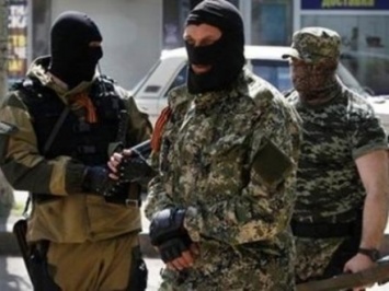 В жилых районах Докучаевска наблюдатели ОБСЕ зафиксировали несколько сотен боевиков