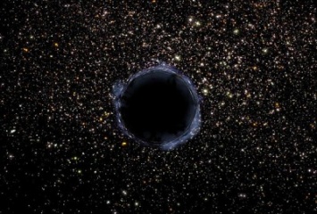 Ученые наблюдают за тем как черная дыра "просыпается" и "глотает" звезду