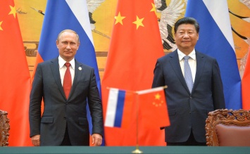 Путин едет в Китай, чтобы продать оружие и заставить Запад нервничать - Newsweek