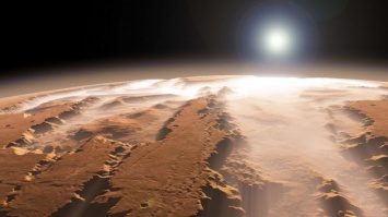 Ученые: На Марсе бывает снег, а на Юпитере шторм