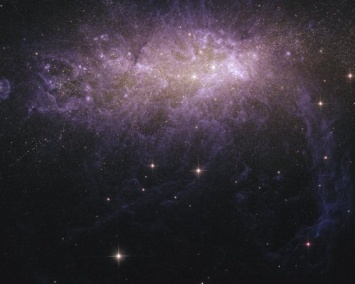 «Хаббл» смог обнаружить в созвездии Геркулеса одинокую многодетную галактику