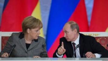 Путин указал Меркель и Олланду: Порошенко продолжает беззакония на Донбассе