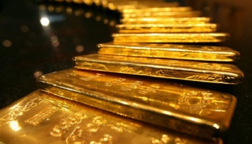 Нацбанк снизил цену на золото