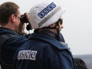 Наблюдатели ОБСЕ зафиксировали новые воронки в жилых районах Марьинки и Коминтерново