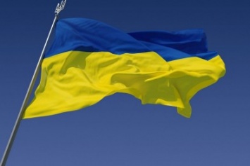 В Каховке офицер ВМС Украины порвал украинский флаг и грозил "русским миром" (фото)