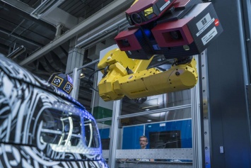 BMW использует быстрые роботизированные оптические сканеры для контроля качества