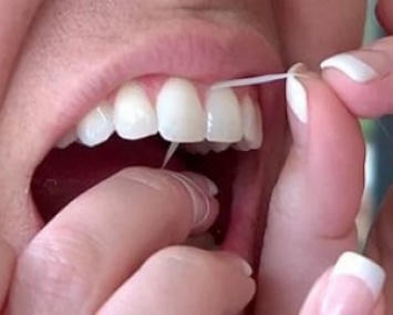 Польза зубной нити преувеличена