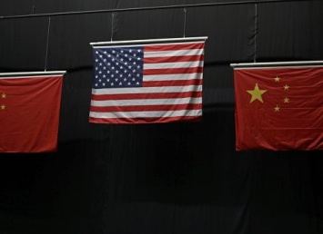 Организаторы Олимпиады признали свою ошибку с искаженными флагами КНР