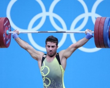 Иранский тяжелоатлет Киануш Ростами установил новый рекорд на олимпийских играх