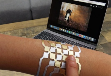 Как управлять MacBook с помощью татуировки [видео]
