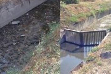 Мариупольцы сегодня увидели две стороны прочистки одной ливневки(ФОТО)