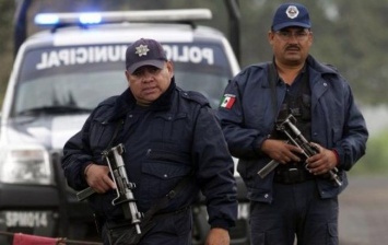 Мексиканских полицейских обвиняют в массовом убийстве