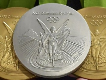 Польский спорстмен продал олимпийскую медаль ради больного раком ребенка