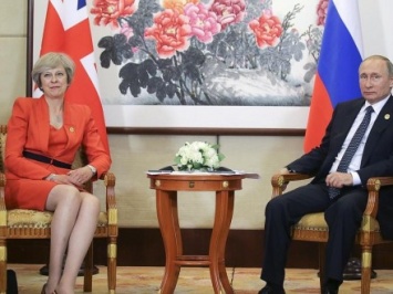 Премьер Великобритании Т.Мэй не подала руку В.Путину для приветствия