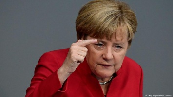 Меркель: Проблема ношения паранджи должна быть срочно решена