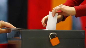 По предварительным данным, партия Меркель потеряла большинство в парламенте Германии