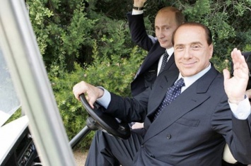 Путин отправил телеграмму Берлускони в честь его 80-летия