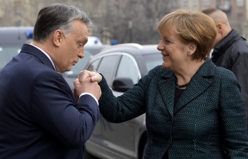 Меркель и Орбан договорились об уступках по мигрантам - СМИ