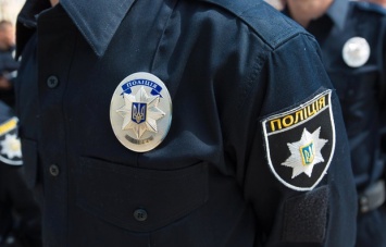 В Киеве у полицейского отобрали пистолет