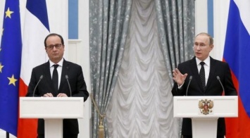 Противостояние Путина и Олланда разожгло предвыборные споры во Франции