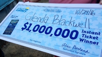 Желая доказать мужу, что лотерея - это обман, американка купила билет и выиграла... миллион долларов!
