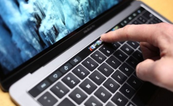 Сенсорная панель Touch Bar в новых MacBook Pro работает под управлением iOS