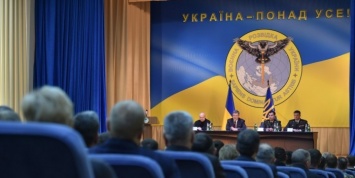 Порошенко представил эмблему ГУР Украины с пронзающей Россию мечом совой