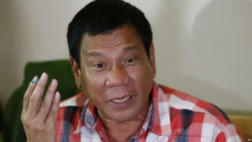 Президент Филиппин требует не вмешиваться в борьбу с наркомафией в стране