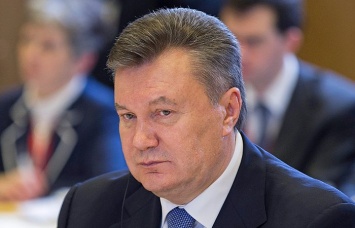 Януковича встретили в Донецке с оружием в руках