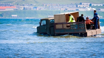 На конкурсе «Отдыхаем в России» победило фото грузовика в реке
