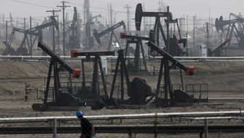 США повлияли на снижение цен на нефть путем увеличения числа буровых установок