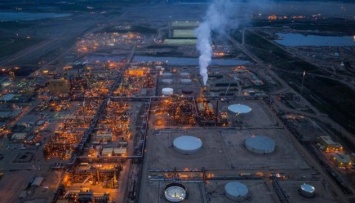 Канаде следует отказаться от разработки нефтяных песков - премьер-министр