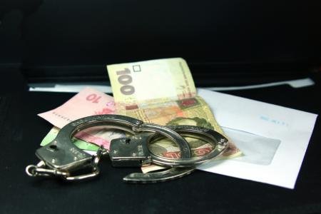 В Днепропетровске арестовали чиновника во время получения взятки
