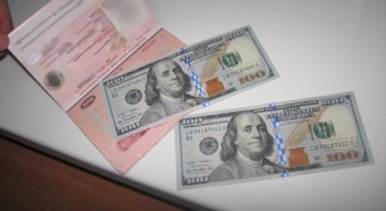 На Сумщине пытались подкупить пограничников долларами США и российскими рублями (+фото)