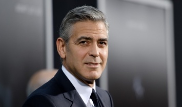 Клуни вдохновился примером Бельмондо