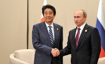 Премьер Японии встретится с Путиным в апреле