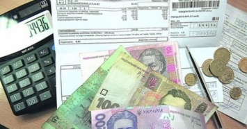 В НБУ предлагают автоматически списывать оплату за коммуналку с зарплатных карт