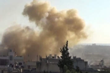 Неизвестные самолеты атаковали тюрьму в Сирии - много погибших